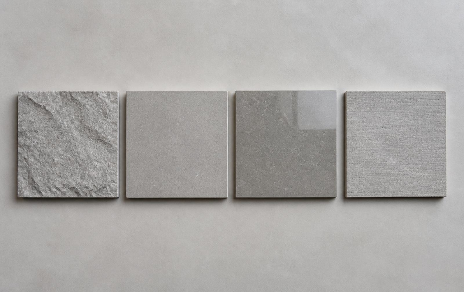 Four samples of the same Shahabad limestone in riven, honed, polished and sawn finishes, side by side